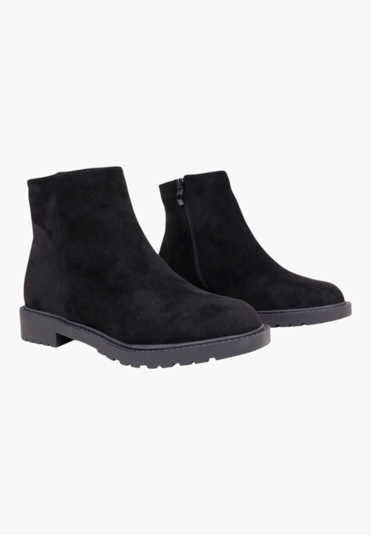 Falio black faux suede ankle boots with a round toe, flat lug sole, and side zipper closure for winter wear.