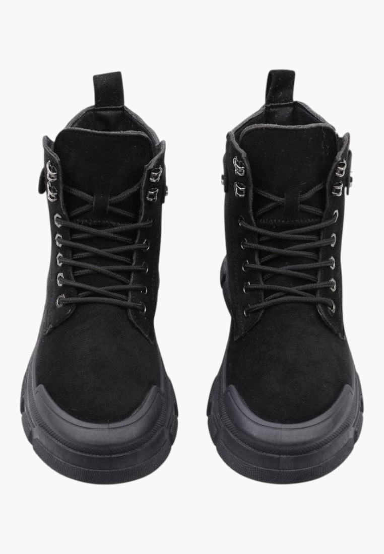 Falio black faux suede lace-up ankle boots with thick lug soles and round toes for a rugged winter style.