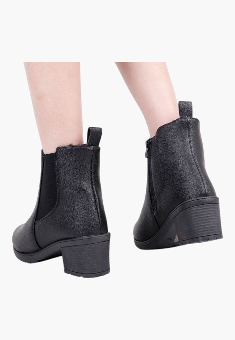 Falio black matte faux leather ankle boots with a square block heel and elastic side panel, back view