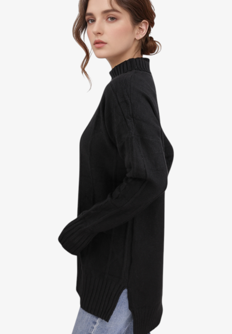 Falio black mock neck sweater with long sleeves and ribbed hem worn by a model in a side profile view