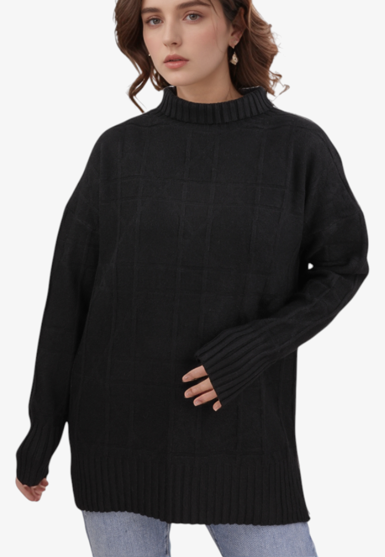 Falio black mock neck sweater with a subtle grid pattern, long sleeves, and ribbed cuffs worn by a woman.