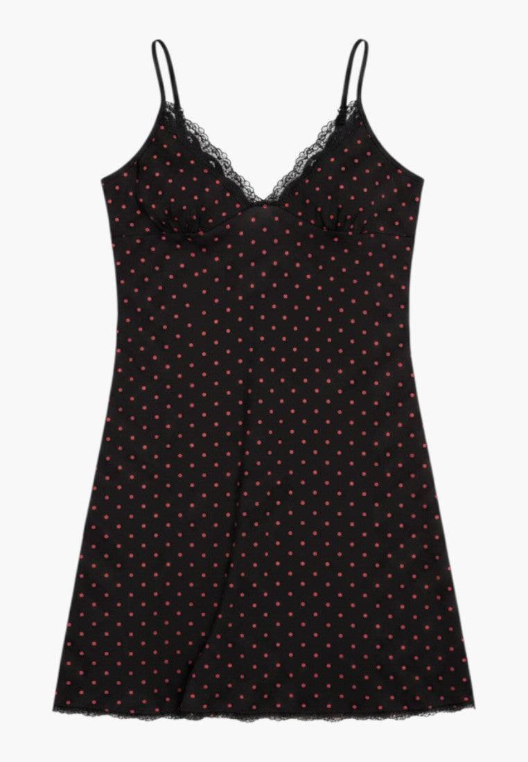 Falio black cotton nightgown with red polka dots and lace trim. Spaghetti straps, V-neck, and above-the-knee length.