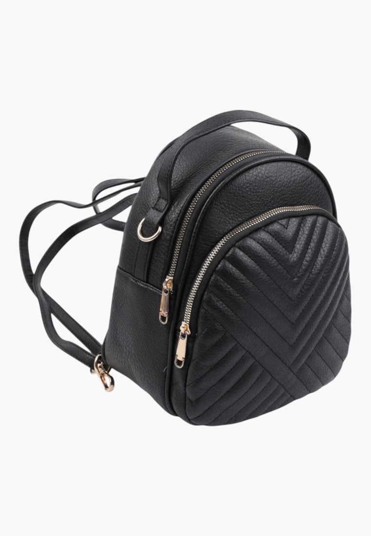 Falio black faux leather city backpack with quilted chevron pattern, zippered compartments, and adjustable straps.