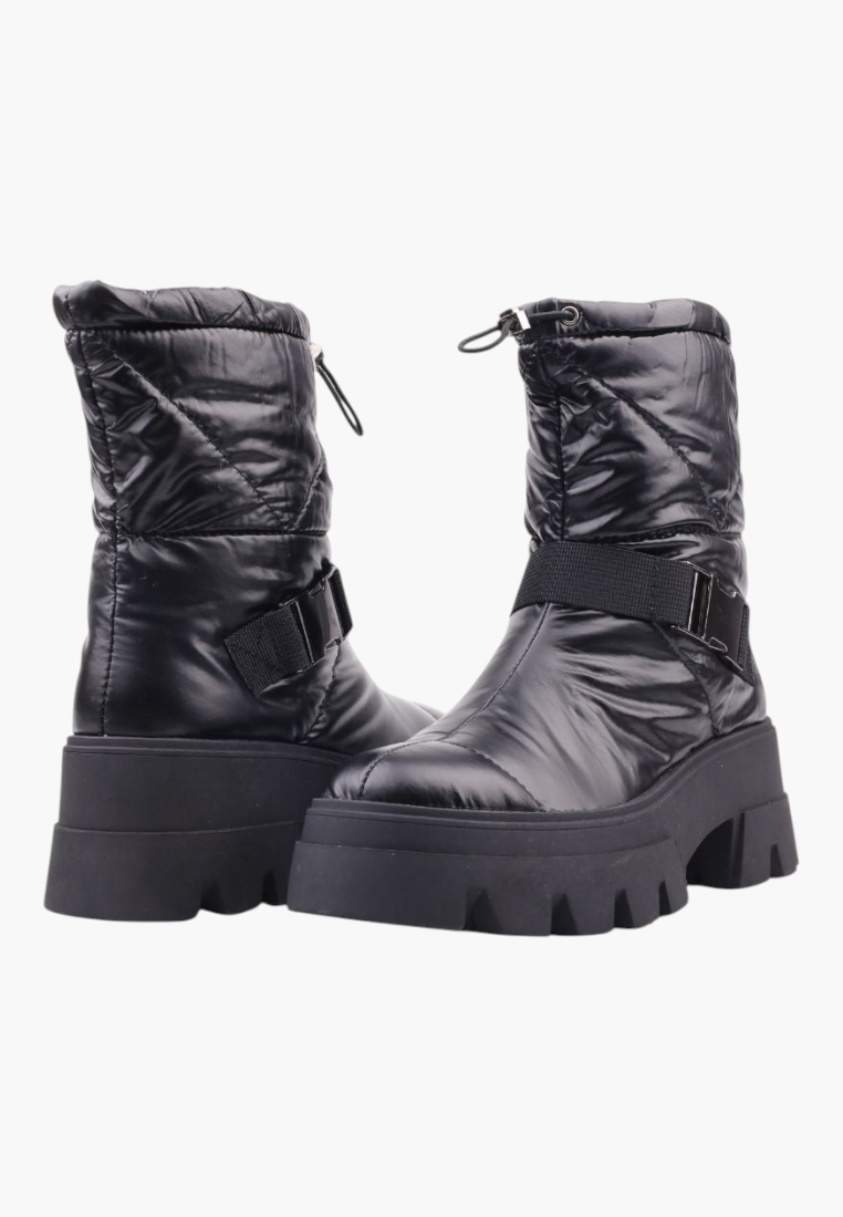 Falio black quilted textile ankle snow boots with thick flat lug soles and decorative strap detail