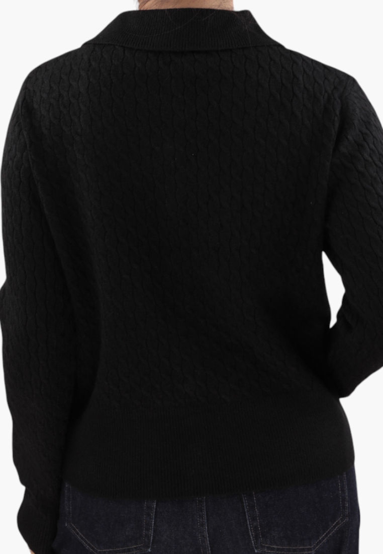Back view of a Falio black sleeveless sweater with a round neckline and textured knit pattern.