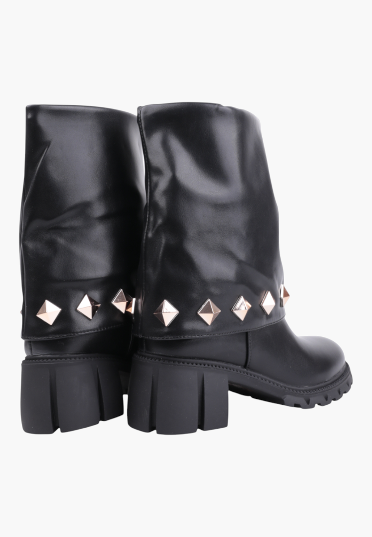 Falio black ankle boots with a folded cuff and decorative gold pyramid studs on a chunky lug sole