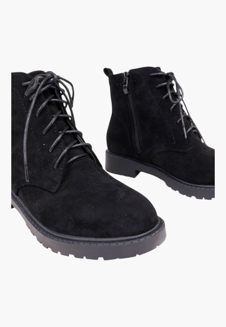 Falio black faux suede ankle boots with lace-up front, side zipper, and flat lug sole for women.