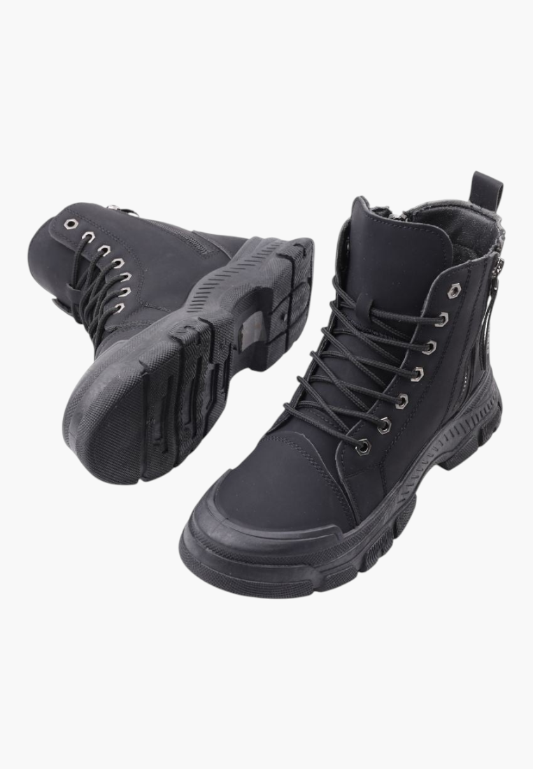 Falio black synthetic nubuck ankle boots with chunky lug soles, lace-up front, and rear pull tab.