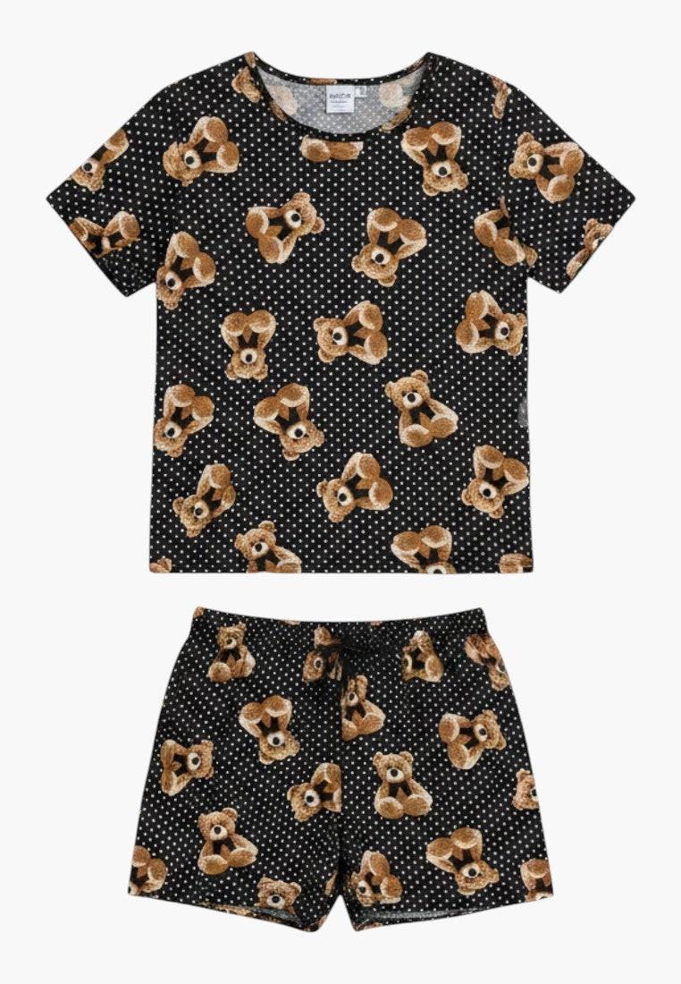 Falio black cotton pajama set with white polka dots and teddy bear print. Short sleeves and shorts for comfortable loungewear.