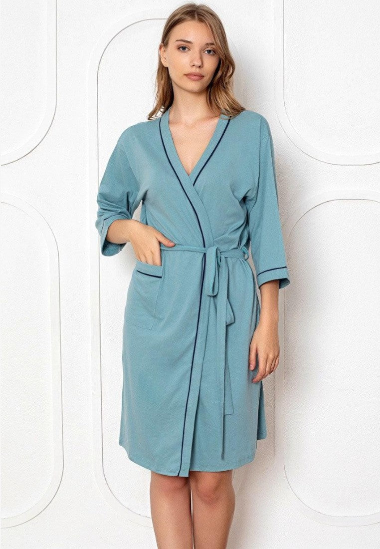 Falio women's blue cotton bathrobe with 3/4 sleeves, tie waist, and pockets, worn by a model.