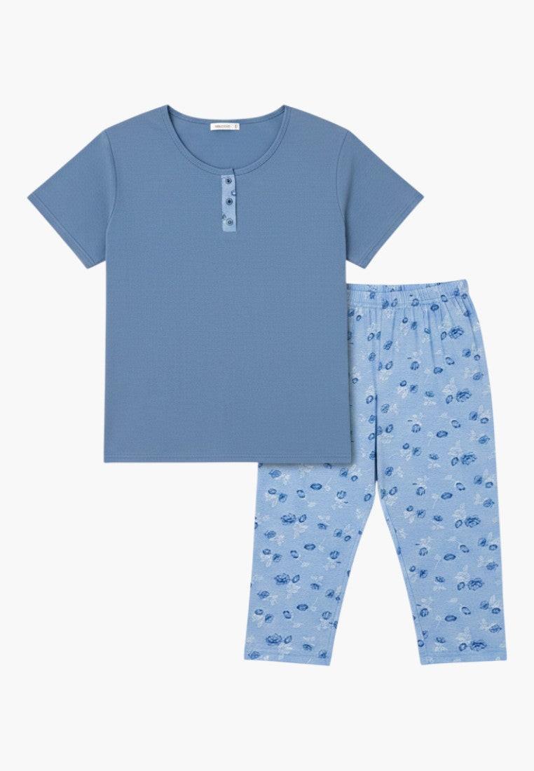 Falio blue cotton 3/4 sleeve plus size pajama set with floral print capri pants and button henley top.