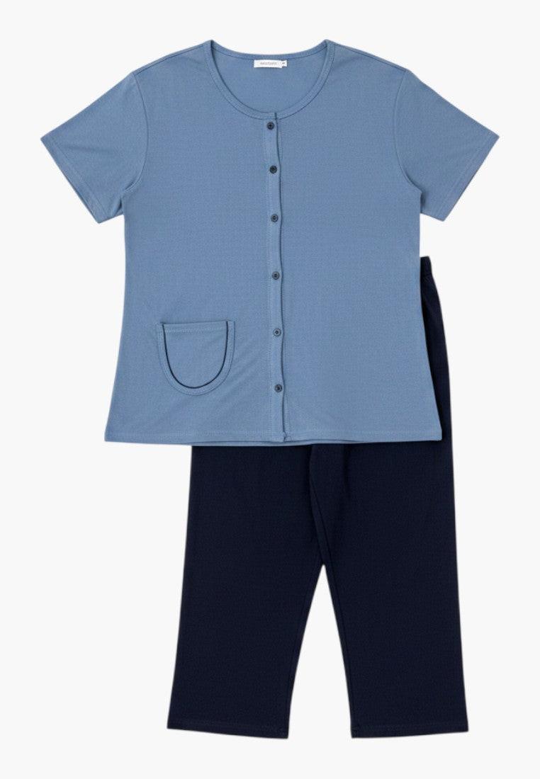 Falio women's blue 100% cotton short sleeve button-up pajama set with 3/4 length pants and a chest pocket.
