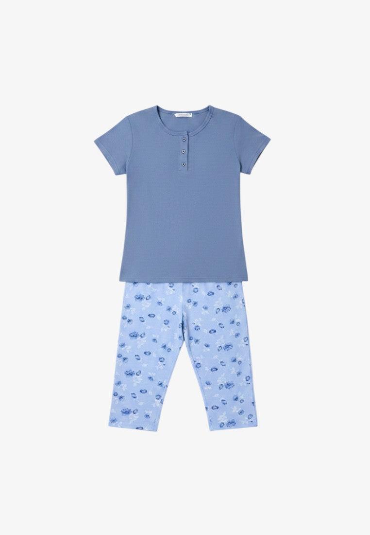Falio women's blue cotton pyjama set with short sleeves and 3/4 length floral print bottoms.