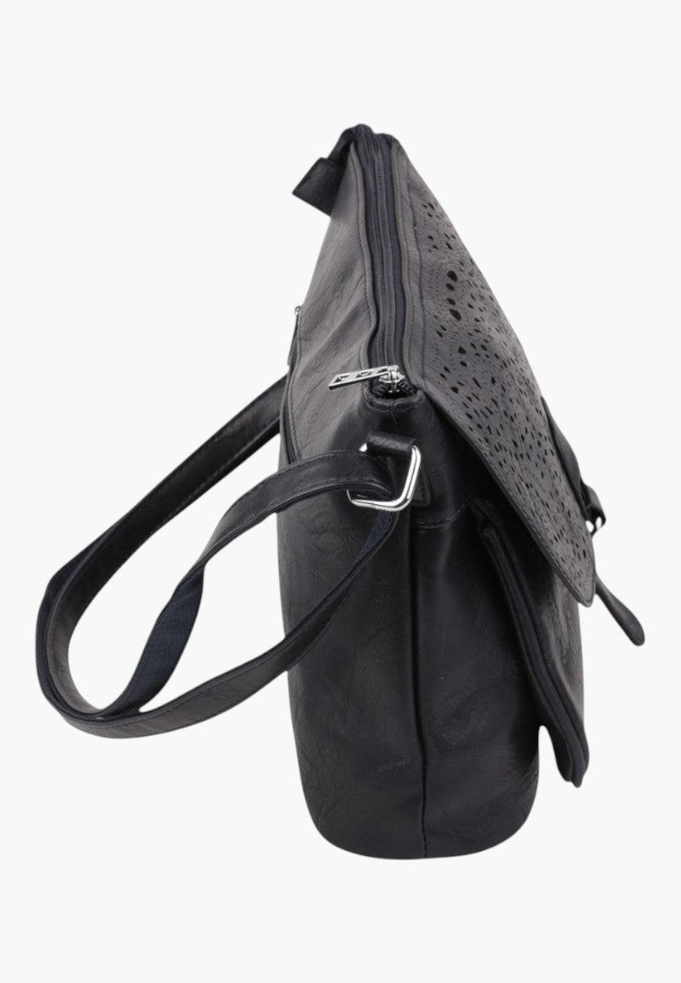 Falio blue crossbody shoulder bag with a perforated flap and silver zipper detail, side view.