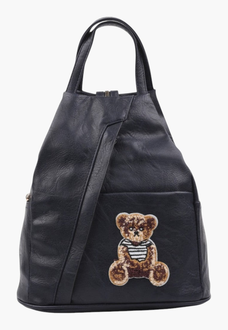 Falio small blue faux leather urban backpack with a cute teddy bear patch and secure zipper closure