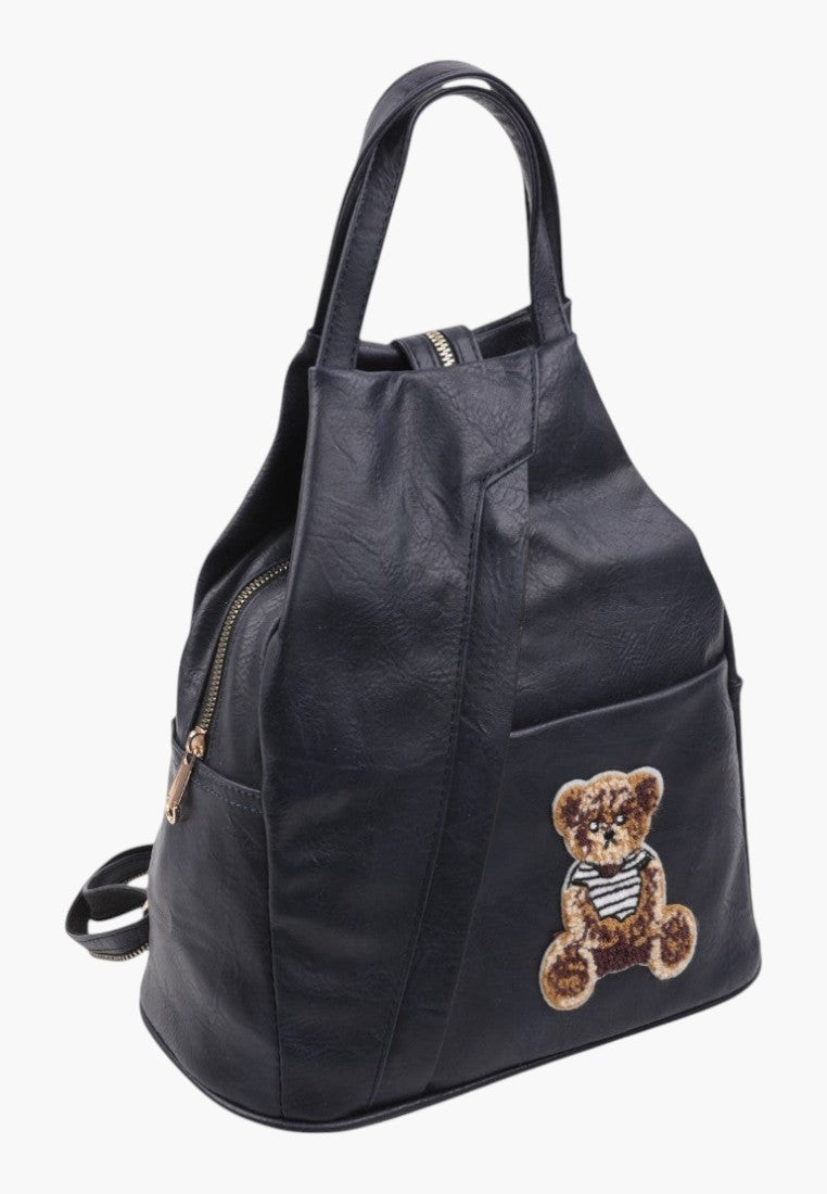 Falio small blue faux leather city backpack with a cute teddy bear patch and secure zipper closure