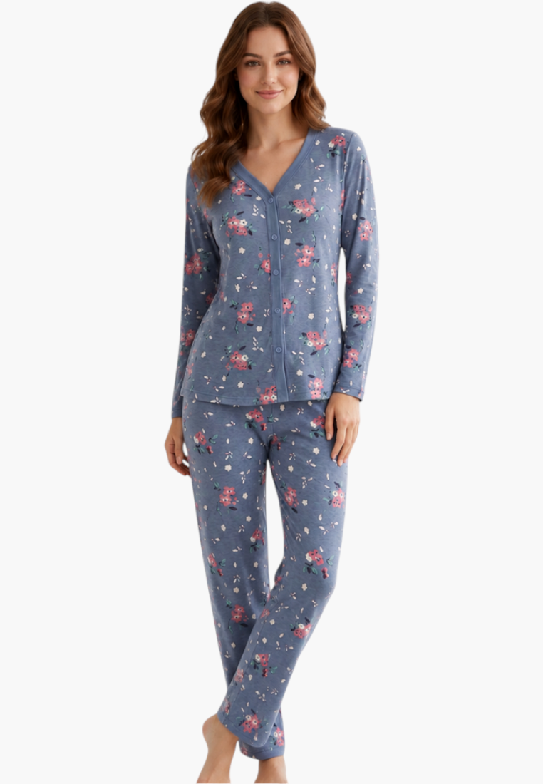 Model wearing a Falio blue floral print cotton pajama set with long sleeves and a button-down top.