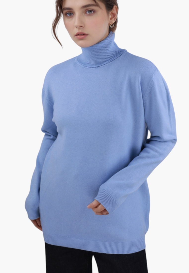 Falio plus size blue viscose blend turtleneck sweater with long sleeves worn by a model against a white background