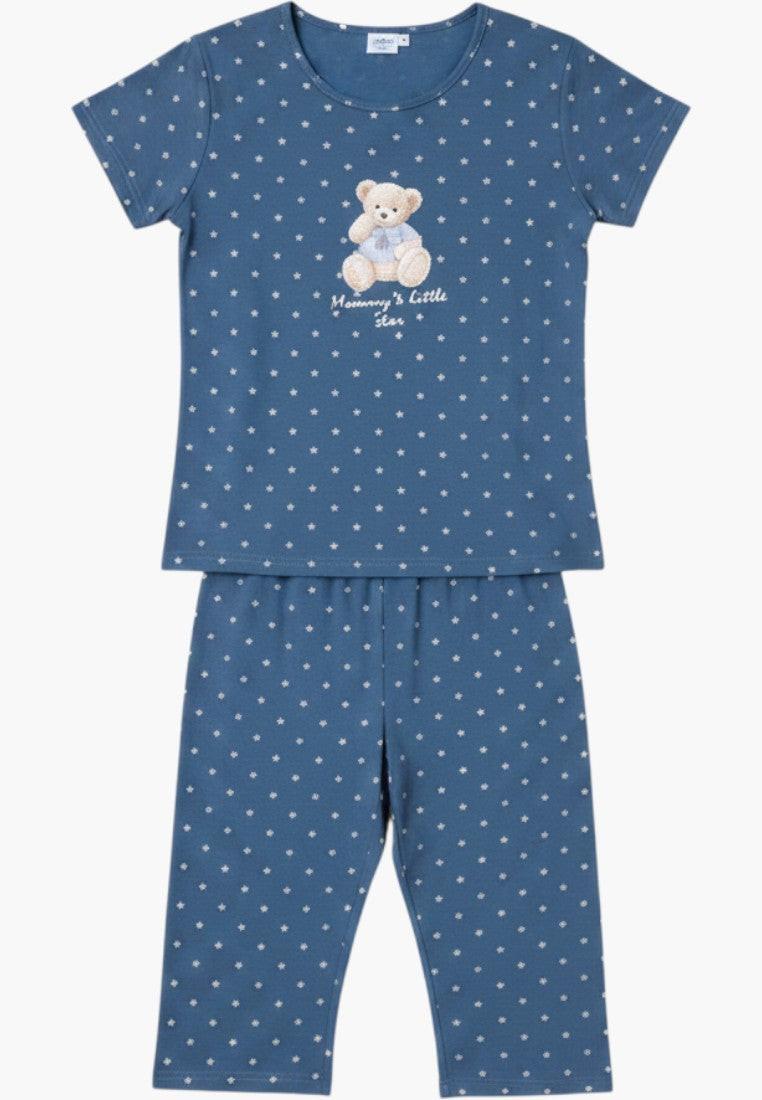 Falio blue cotton pajama set with short sleeves and 3/4 length pants featuring a teddy bear print and small white stars.