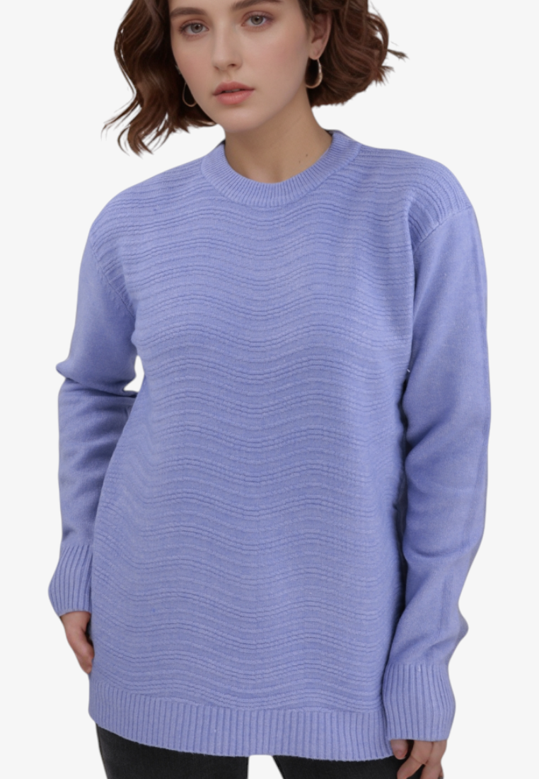 Model wearing a Falio blue wool-blend sweater with a round neckline and subtle wavy texture pattern.