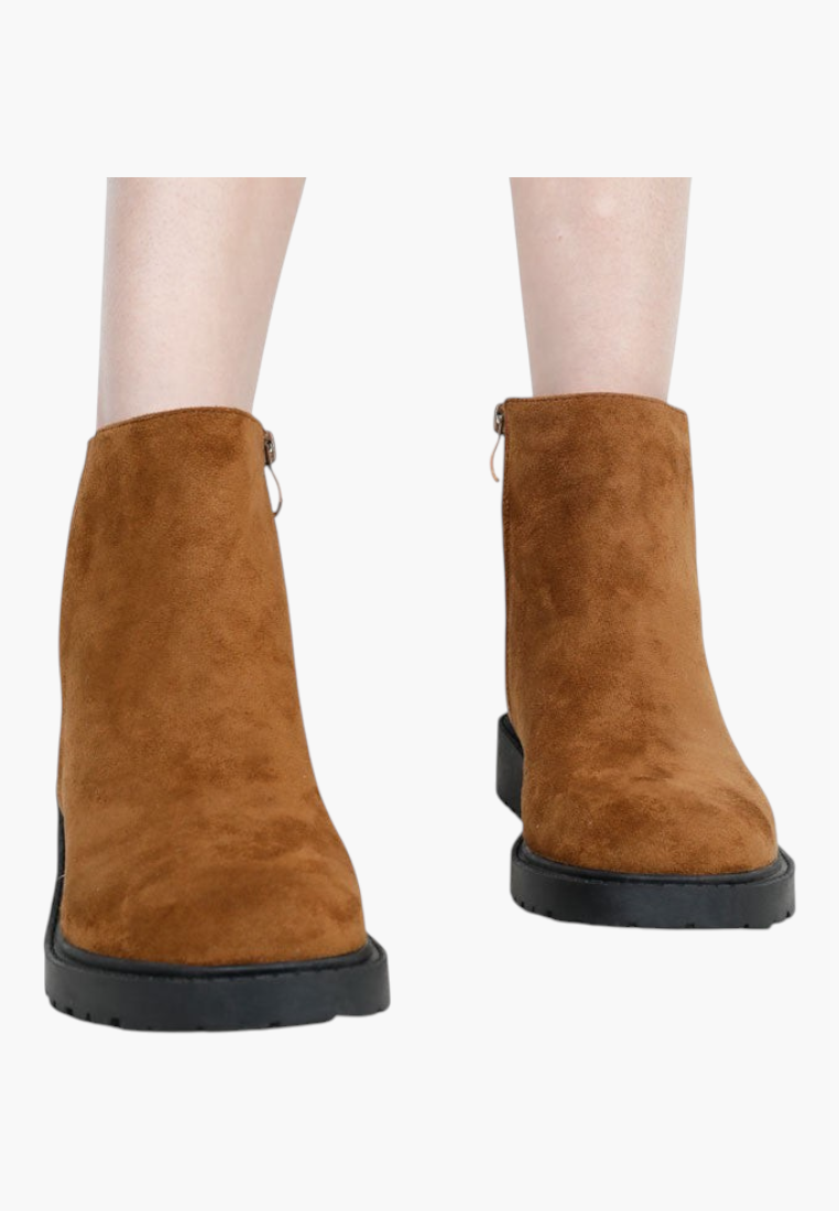 Falio Bonnaire brown suede ankle boots with a chunky black lug sole and side zipper closure