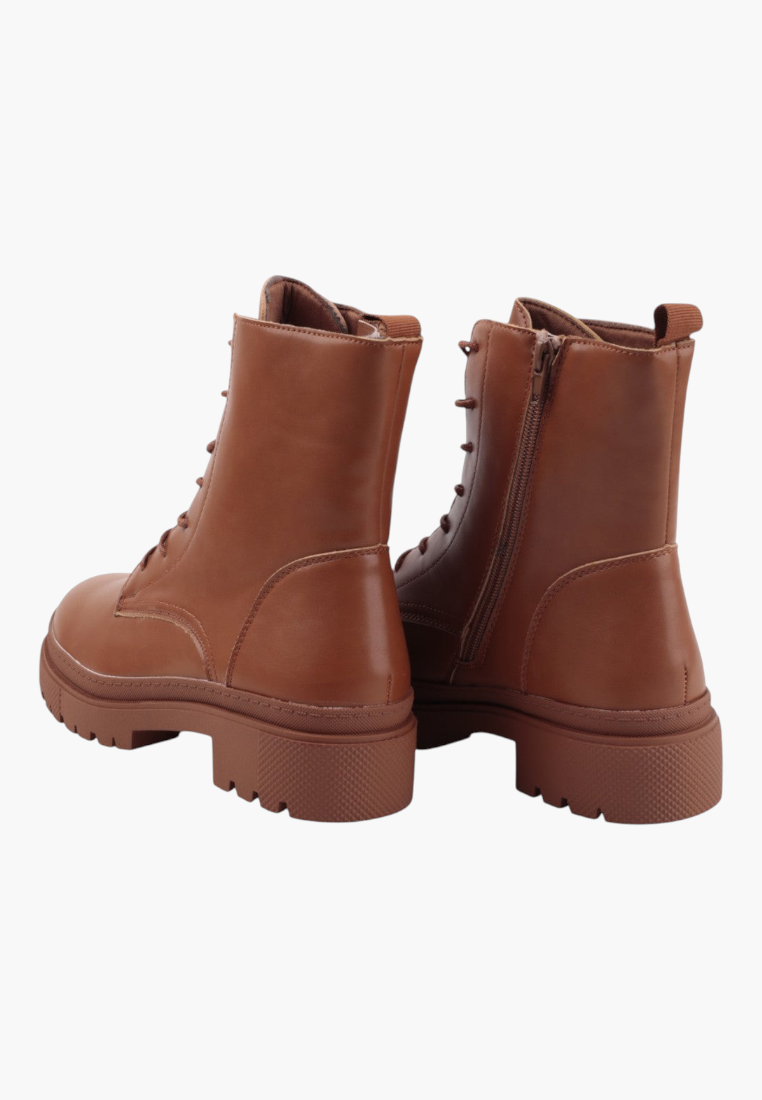 Falio brown faux leather ankle boots with lace-up front, side zipper, and chunky lug soles for autumn and winter.