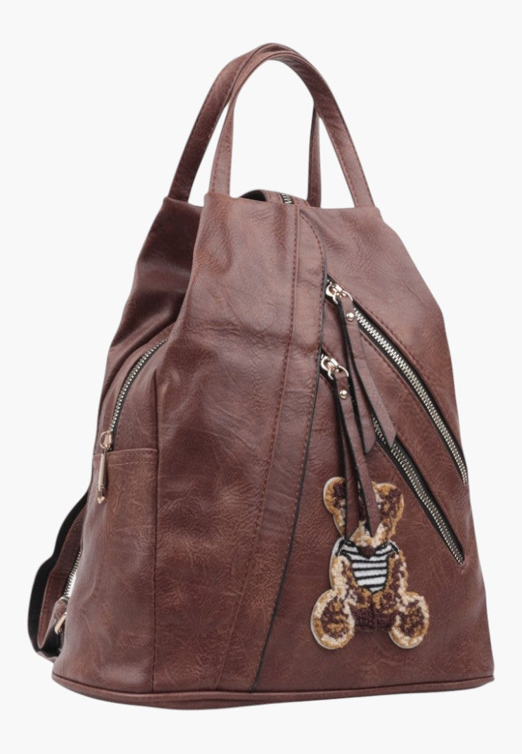 Falio brown faux leather urban backpack with a cute bear patch and multiple zippered pockets