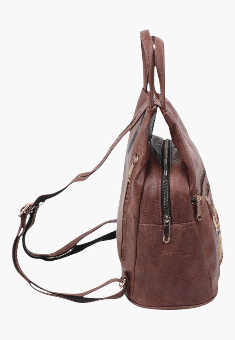 Falio small brown faux leather city backpack with multiple zippered pockets and adjustable straps, side view