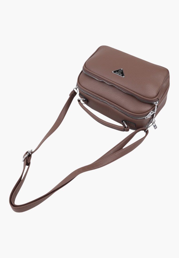 Falio brown faux leather crossbody bag with multiple zippered compartments and an adjustable shoulder strap