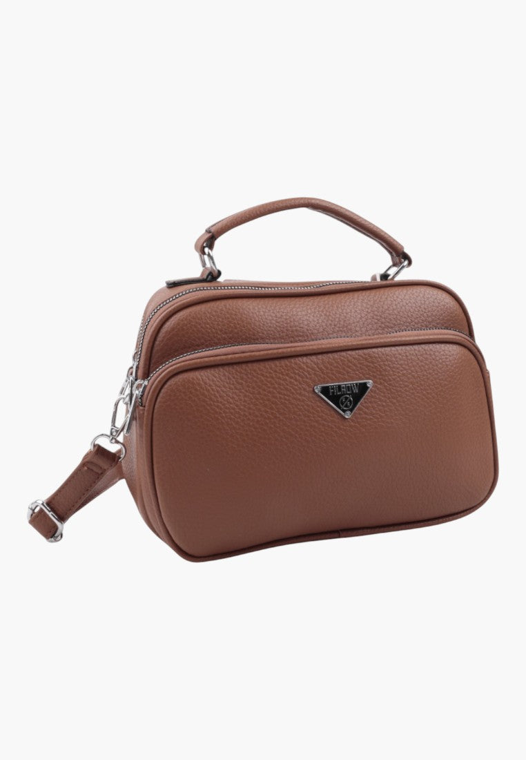 Falio brown faux leather crossbody bag with top handle, silver hardware, and multiple zippered compartments.