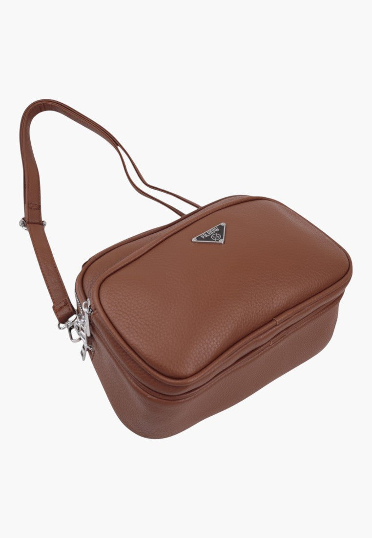 Falio brown faux leather crossbody bag with a structured rectangular shape, silver hardware, and zipper closure.