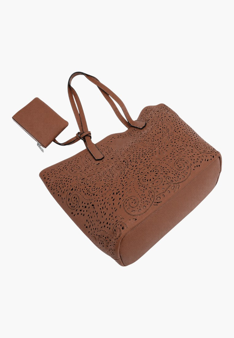 Falio brown faux leather shopper bag with intricate laser-cut floral patterns and a matching small zippered pouch