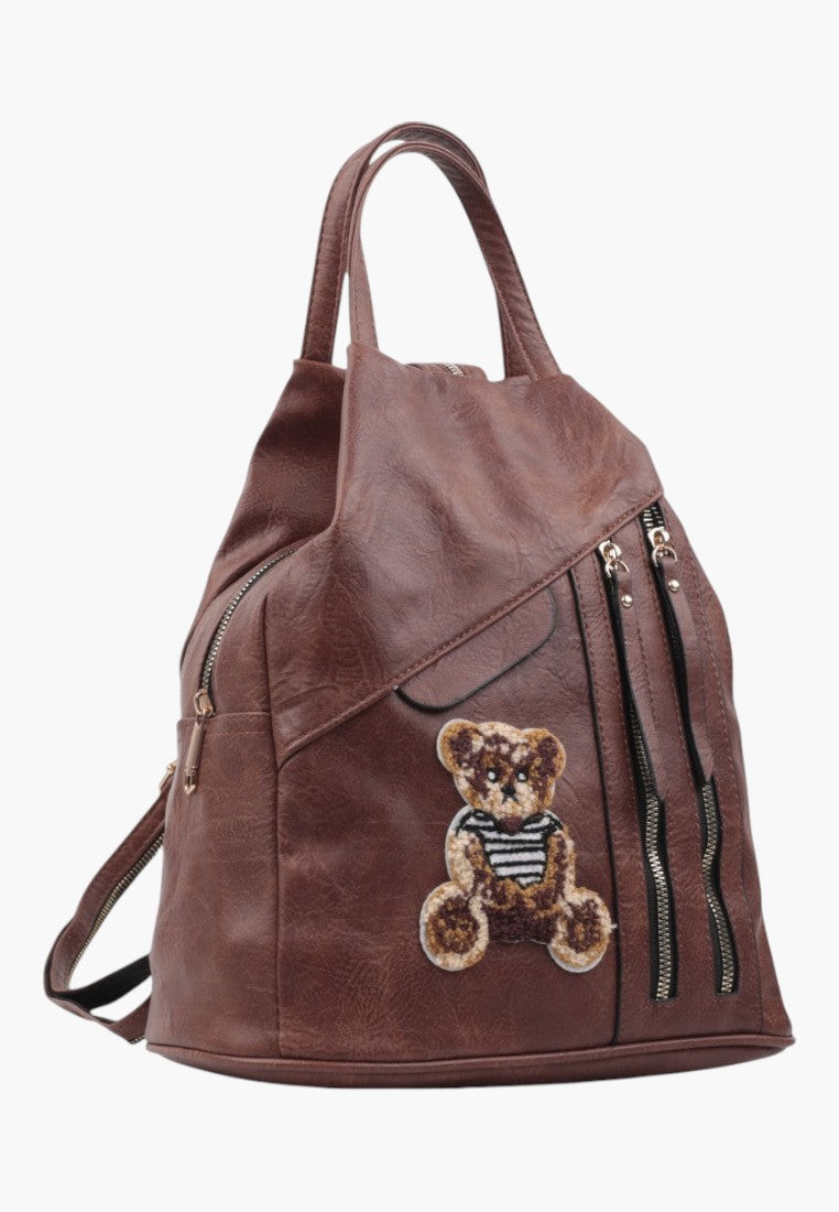 Falio brown faux leather urban backpack with a cute teddy bear patch and multiple zippered pockets
