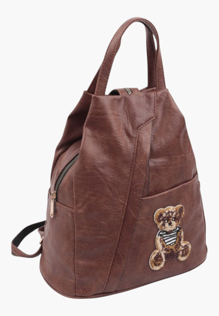 Falio small brown faux leather city backpack with a cute teddy bear patch and zippered compartments