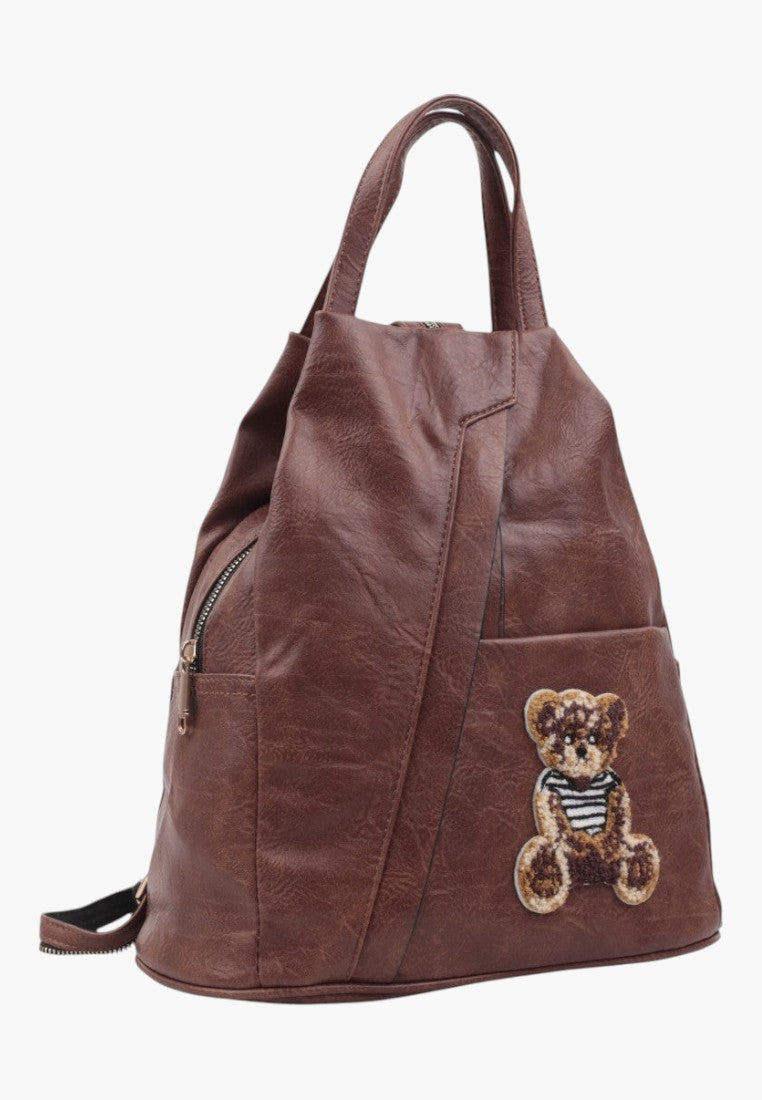 Falio small brown faux leather city backpack with a cute teddy bear patch and zipper closure