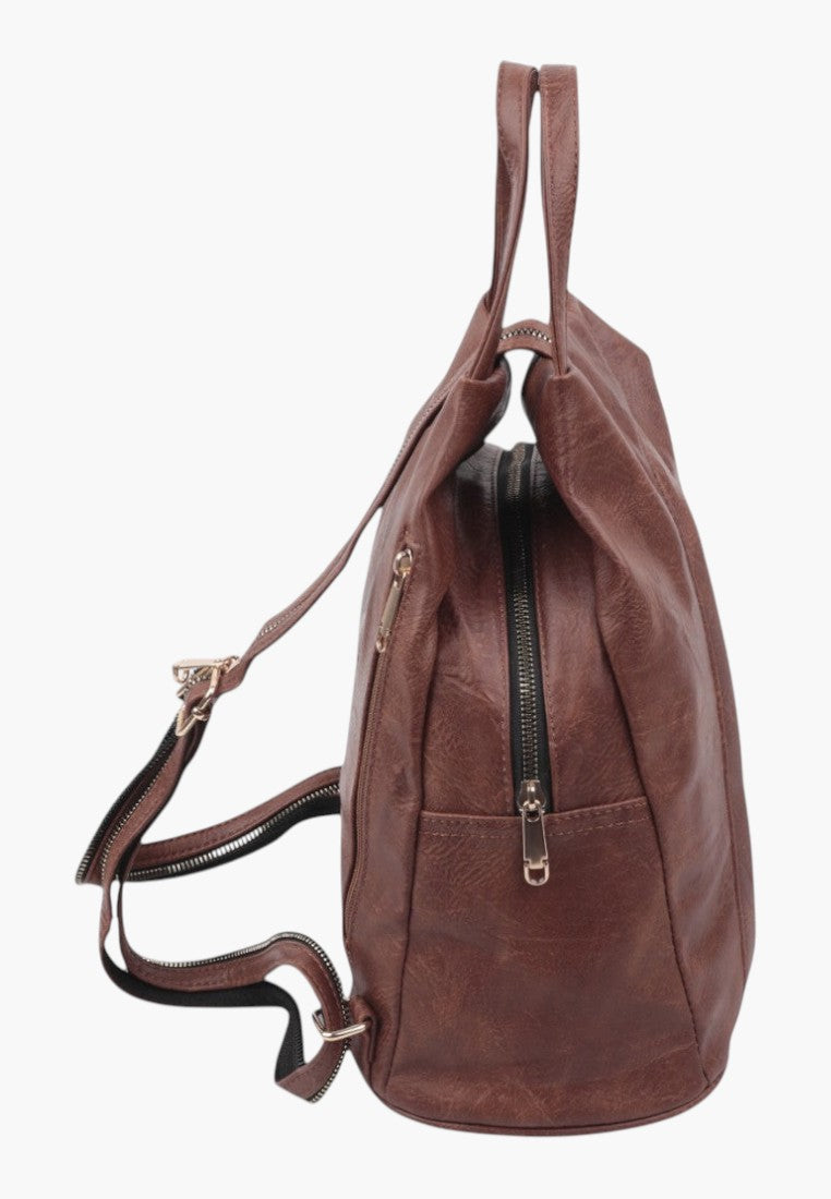 Falio small brown faux leather urban backpack with zippered compartments and adjustable straps, side view