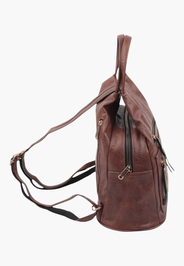 Falio brown faux leather urban backpack with multiple zippered pockets and adjustable straps, side view