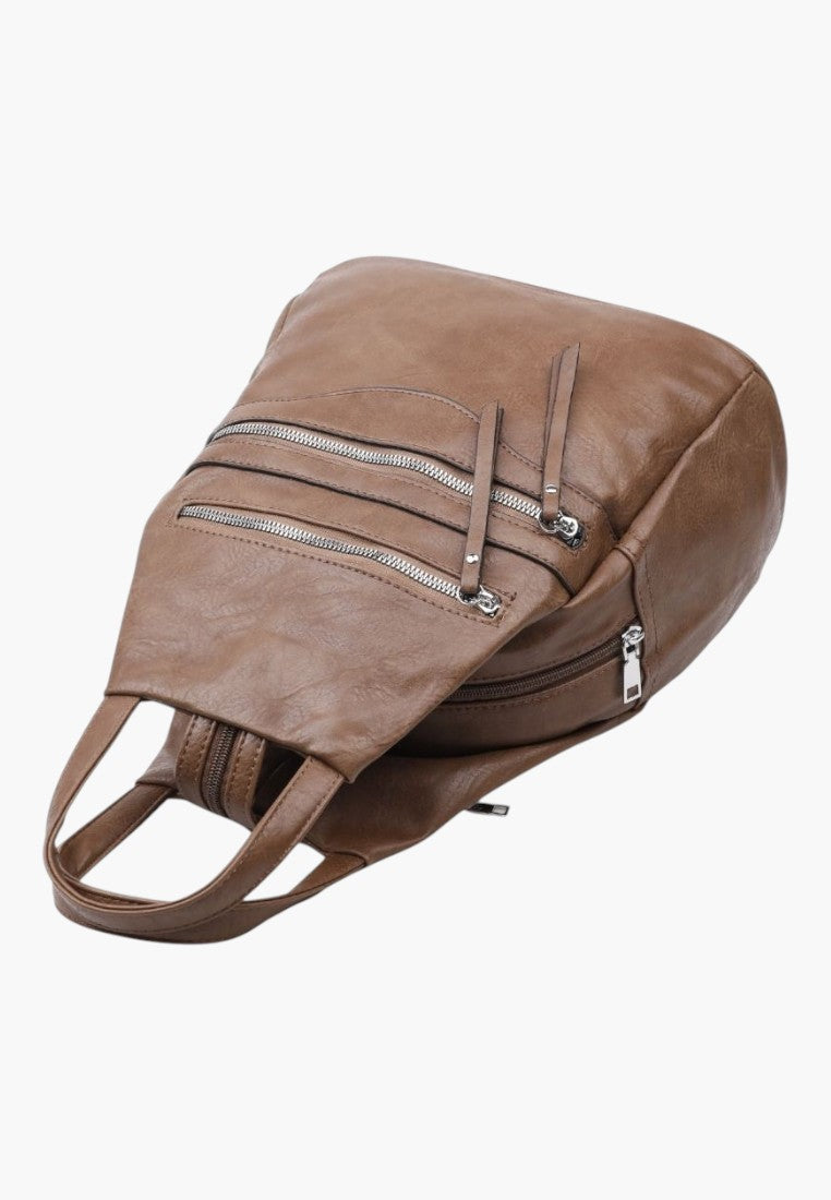 Falio brown faux leather urban backpack with multiple zippered pockets and a spacious 16L capacity.