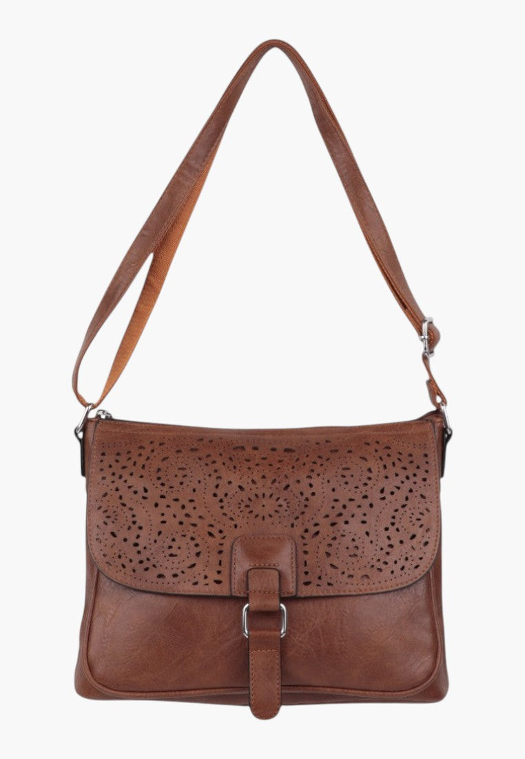Falio brown leather crossbody bag with decorative laser-cut floral pattern on the front flap and adjustable strap