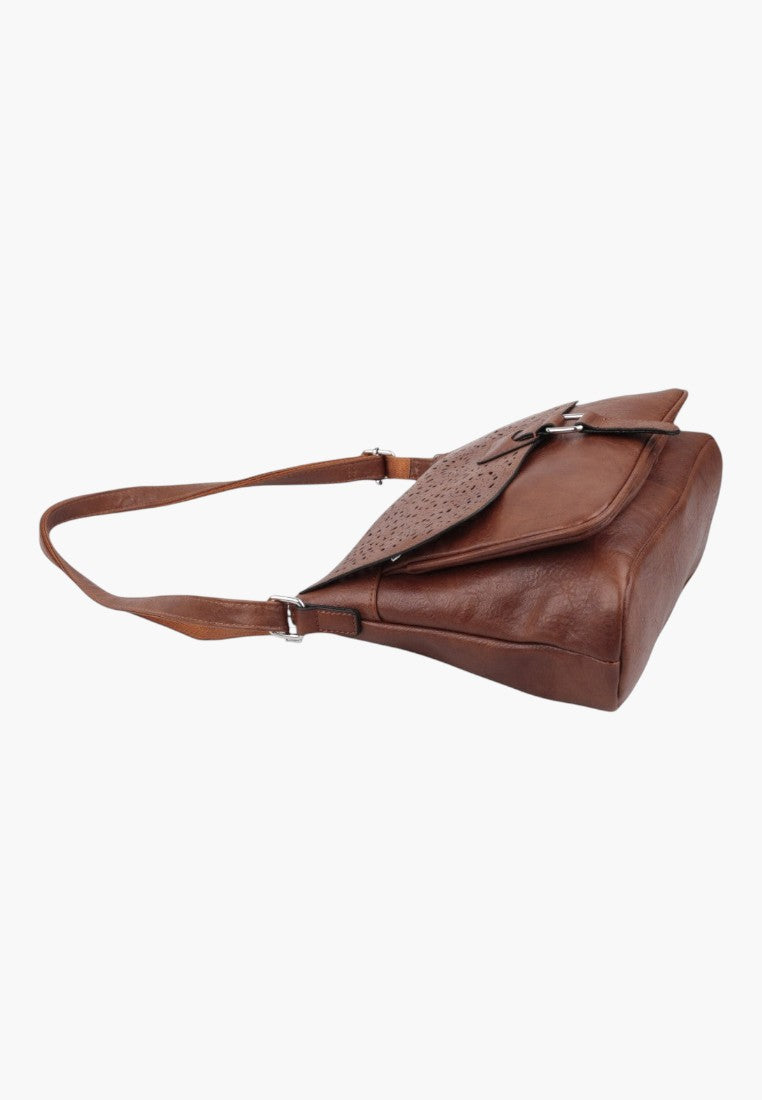 Falio brown leather crossbody bag with a perforated flap and adjustable shoulder strap on a white background