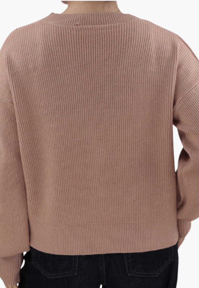 Back view of a Falio brown ribbed viscose blend sweater with long sleeves worn over dark jeans