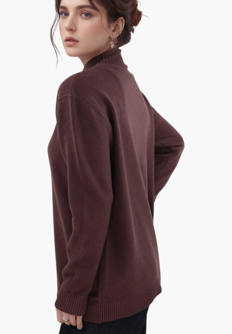 Falio plus size brown viscose sweater with a mock neck and long sleeves worn by a woman, side view