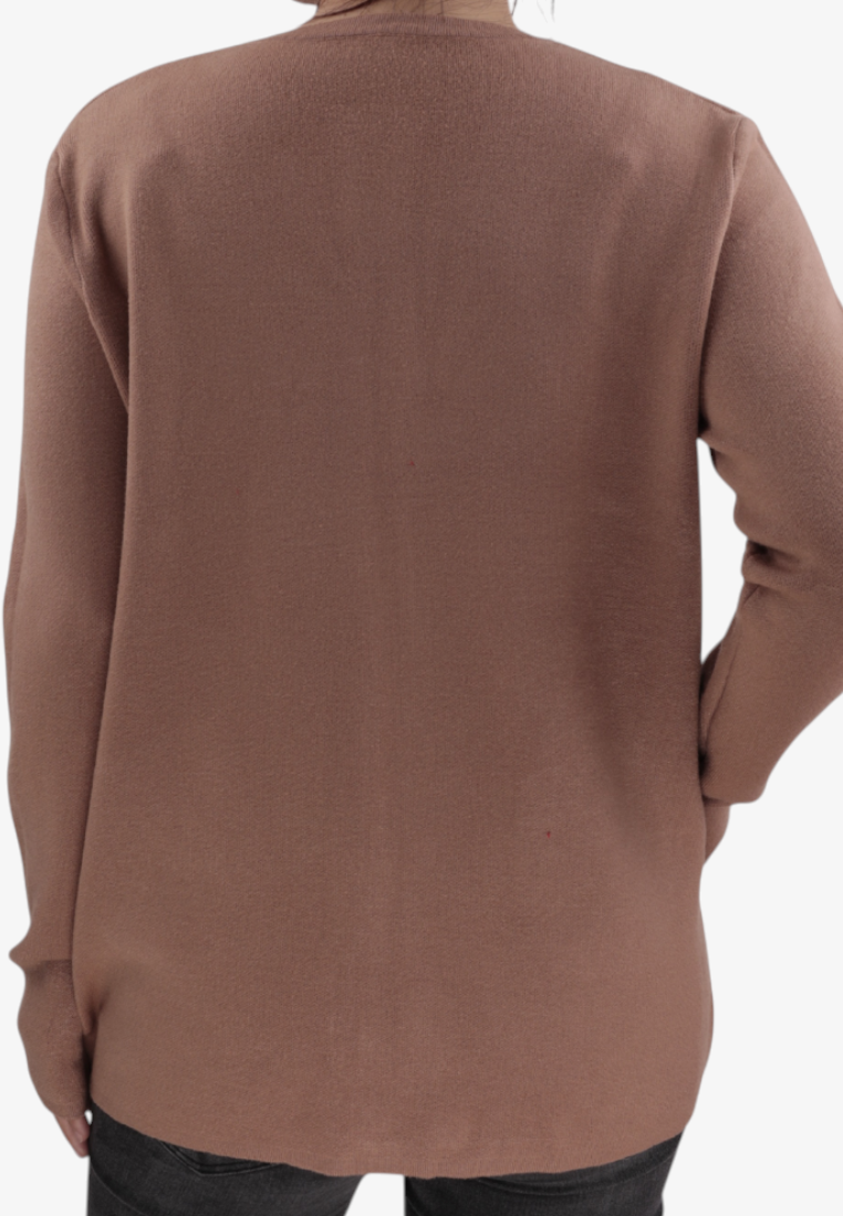 Back view of a Falio plus size brown viscose sweater with long sleeves and side pockets worn over dark jeans