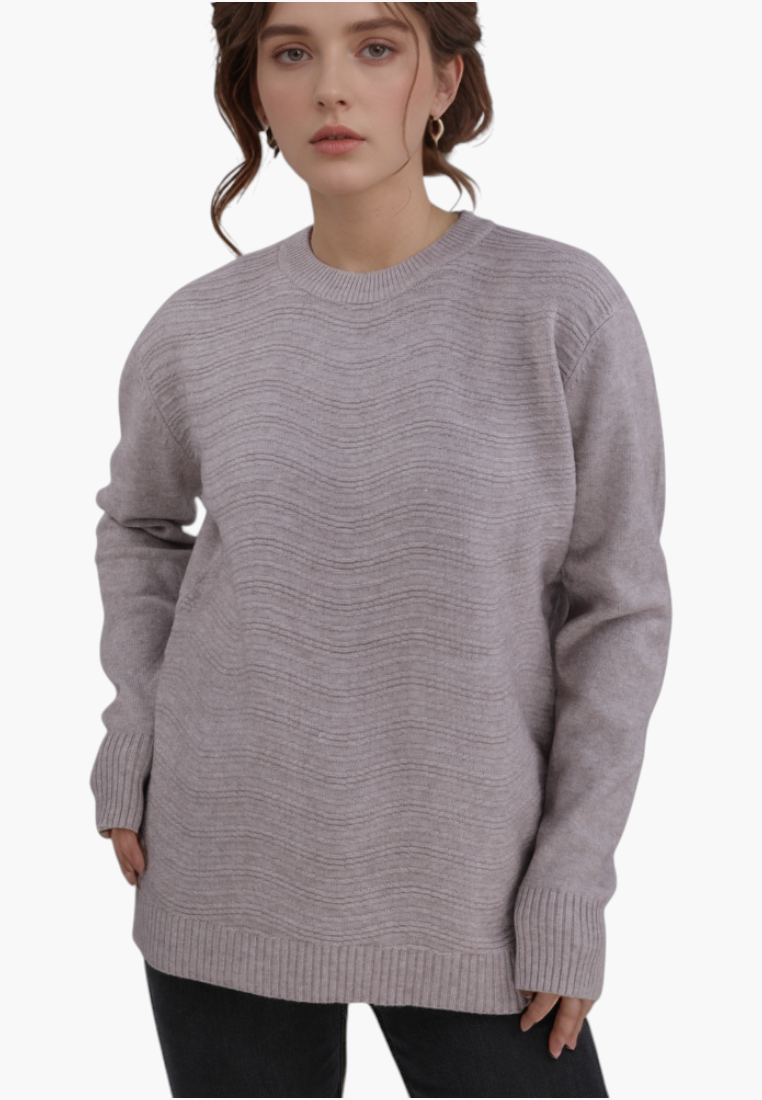 Falio brown wool blend sweater with round neck and ribbed cuffs worn by a woman on a white background