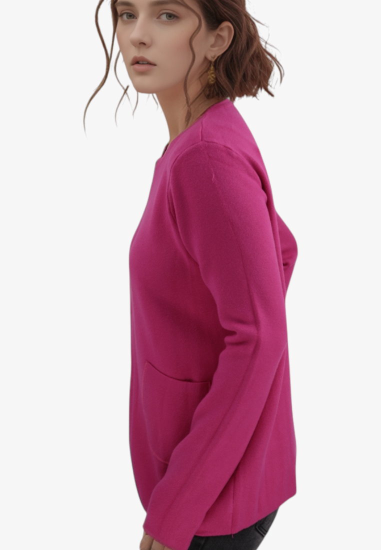 Falio plus size fuchsia viscose sweater with long sleeves and side pockets worn by a model in profile view