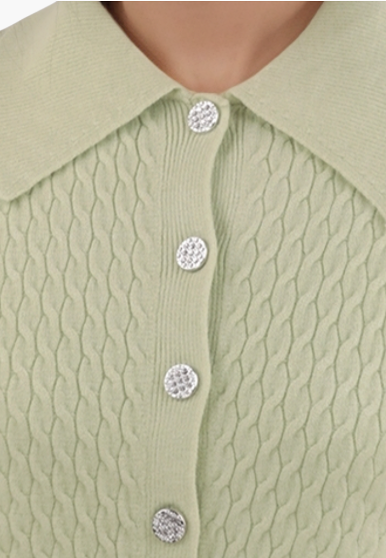 Falio green cable knit cardigan with a classic collar and decorative silver buttons in a close-up view