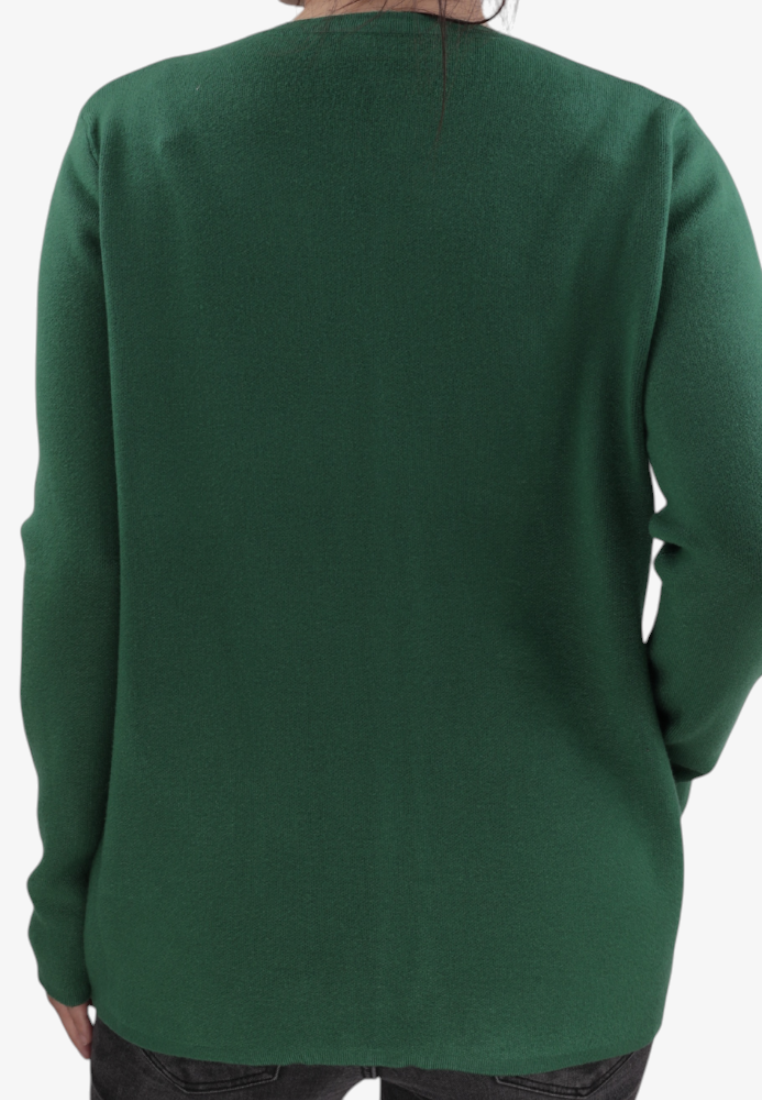 Back view of a Falio plus size green viscose sweater with long sleeves and pockets on a model