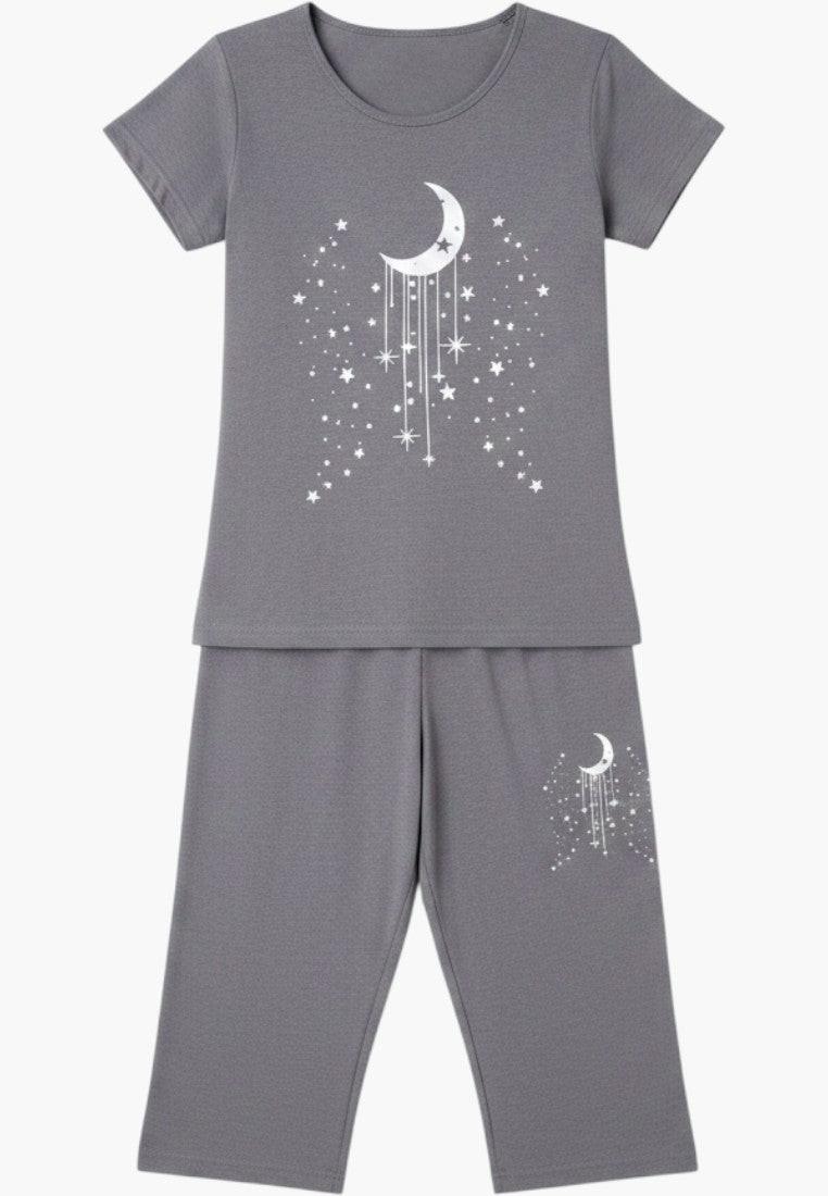 Falio grey cotton women's pajama set with short sleeves and 3/4 pants featuring a moon and stars print.