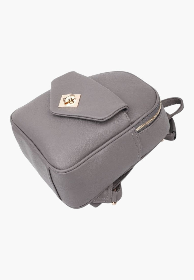 Falio grey faux leather urban backpack with gold hardware, front flap pocket, and secure zip closure.