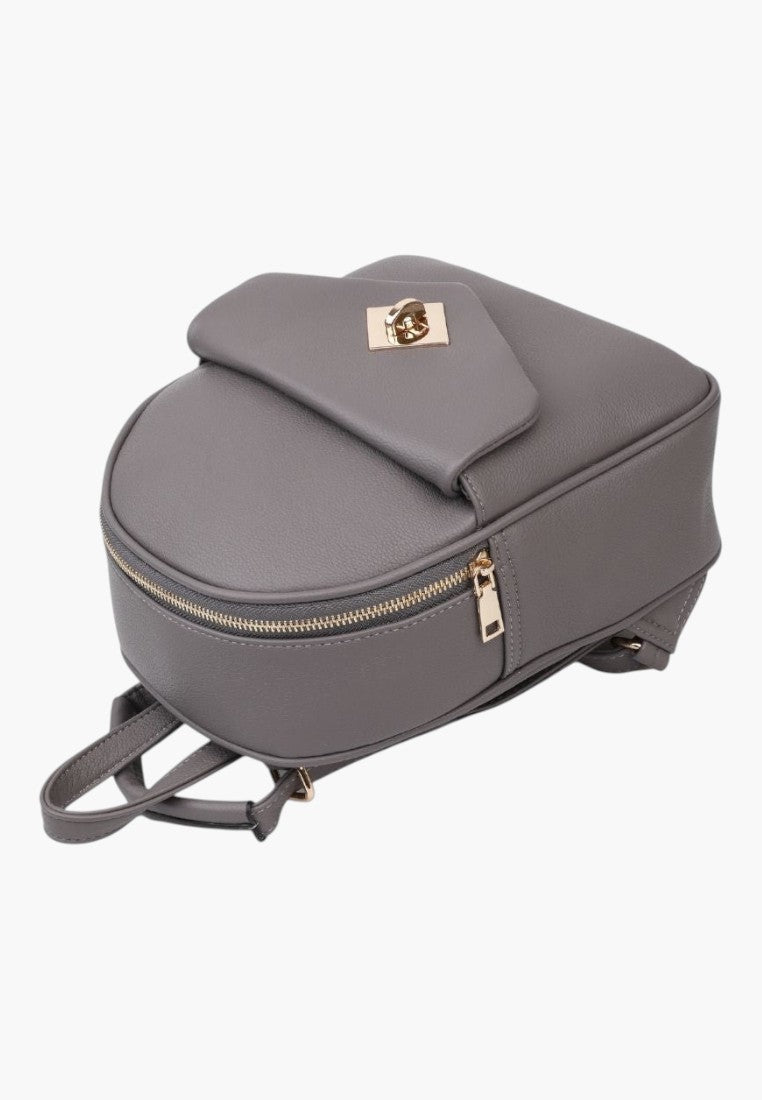 Falio grey faux leather urban backpack with gold hardware, two compartments, and secure zipper closure.
